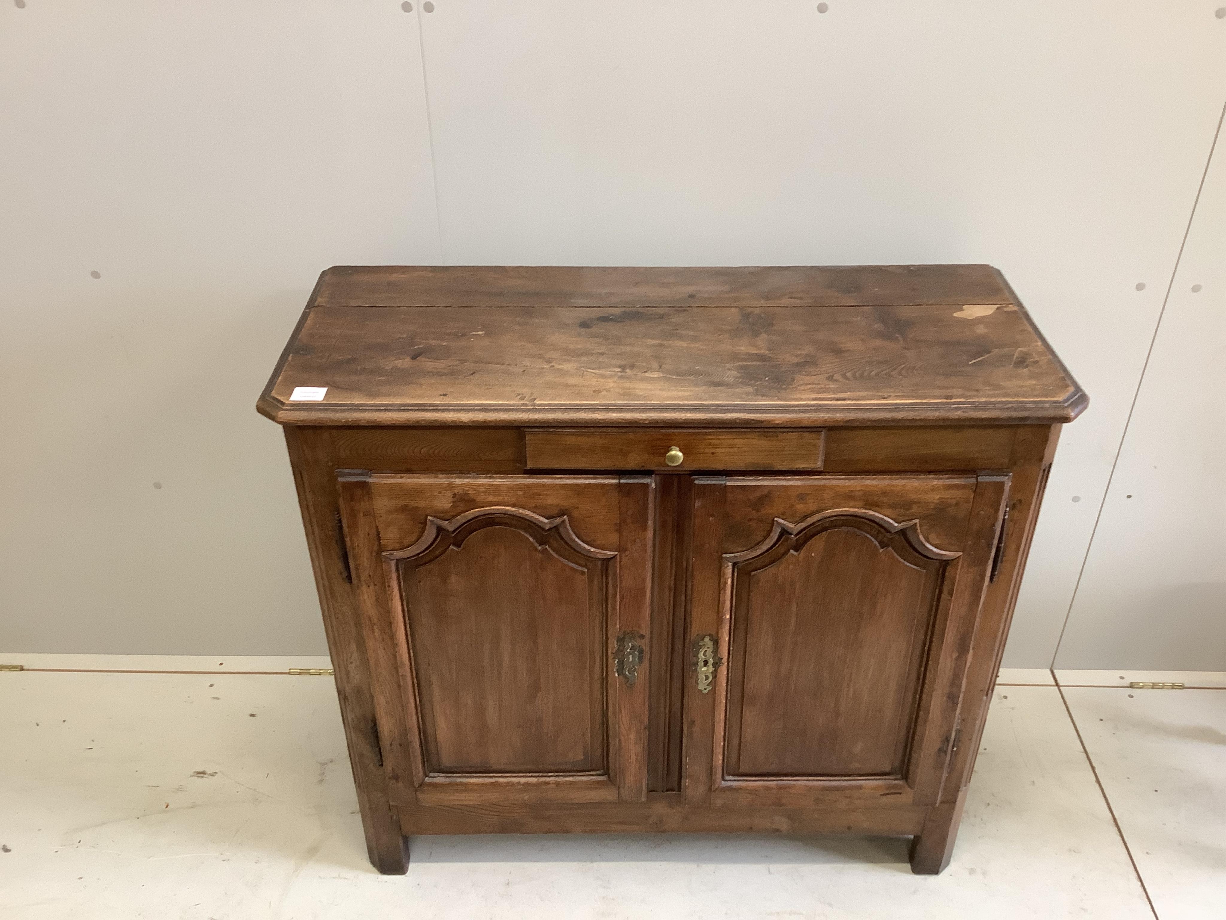 A 19th century French oak cupboard, width 108cm, height 97cm. Condition - a little faded and rubbed, otherwise good